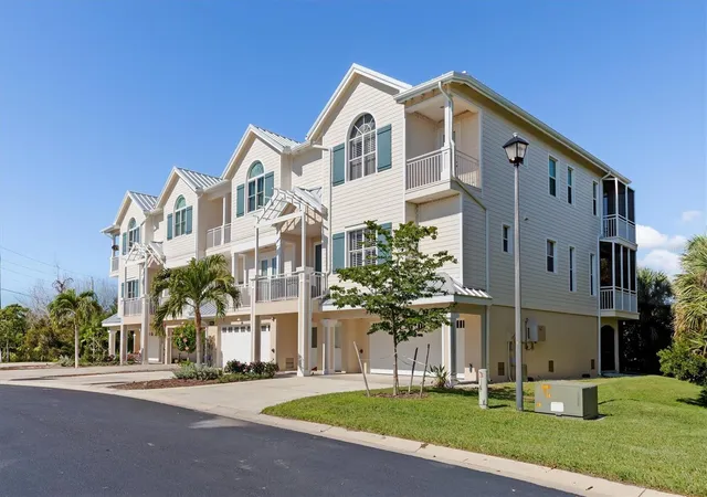 Photo 1 of Townhouse for sale at 10300 Tarpon Landings Ter #4, Placida, FL 33946 | MLS# A4704997 | Listing updated on 2026-09-13