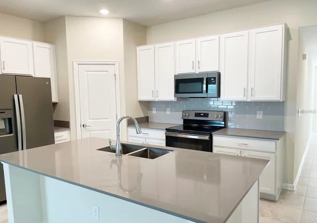 Photo 2 of Single family home for sale at 4489 Magnolia Ridge Ct, Kissimmee, FL 34746 | MLS# O6438984 | Listing updated on 2026-09-04