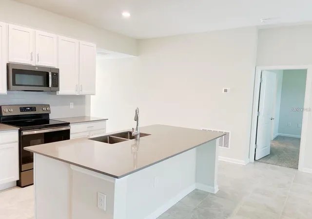 Photo 3 of Single family home for sale at 4489 Magnolia Ridge Ct, Kissimmee, FL 34746 | MLS# O6438984 | Listing updated on 2026-09-04