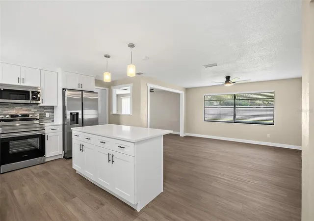 Photo 3 of Single family home for sale at 977 Whiporwill Dr, Port Orange, FL 32127 | MLS# V4951108 | Listing updated on 2026-09-29