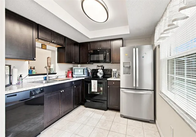 Photo 4 of Condo for sale at 1370 Heather Ridge Blvd #104, Dunedin, FL 34698 | MLS# TB8545372 | Listing updated on 2026-10-11