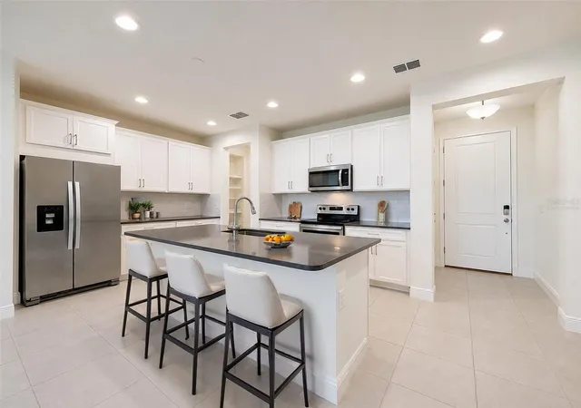 Photo 3 of Townhouse for sale at 2404 Arch Ave, Oldsmar, FL 34677 | MLS# TB8545397 | Listing updated on 2026-10-05