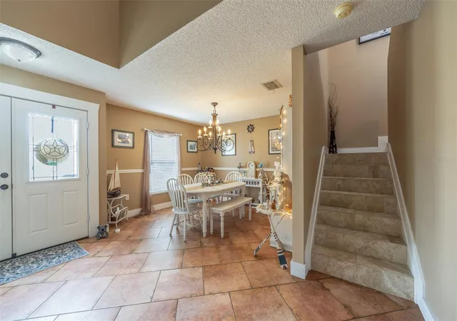 Photo 4 of Single family home for sale at 17 Pinell Ln, Palm Coast, FL 32164 | MLS# FC321201 | Listing updated on 2026-09-16