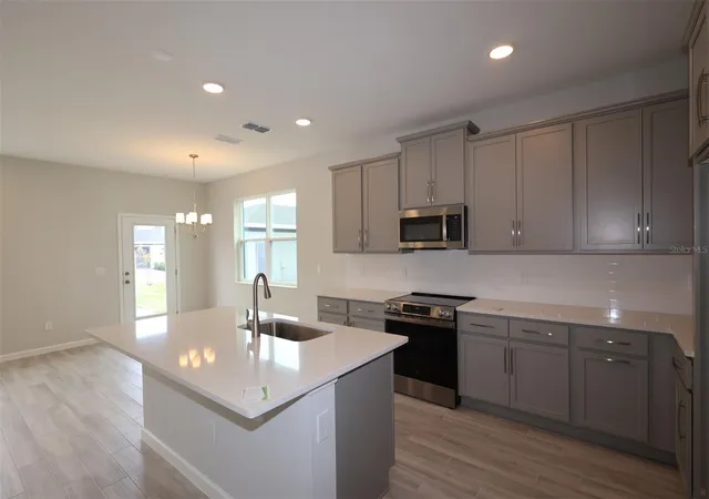 Photo 2 of Townhouse for sale at 1405 Hyde St, Saint Cloud, FL 34771 | MLS# O6439056 | Listing updated on 2026-09-04