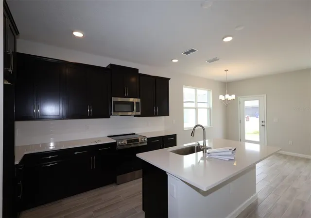 Photo 3 of Townhouse for sale at 1385 Hyde St, Saint Cloud, FL 34771 | MLS# O6439076 | Listing updated on 2026-09-04