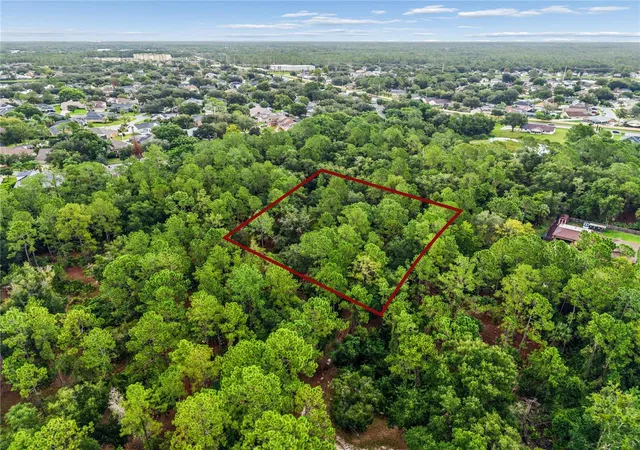 Photo 1 of Land for sale at 14133 Lund Dr, Orlando, FL 32826 | MLS# O6439077 | Listing updated on 2026-10-05