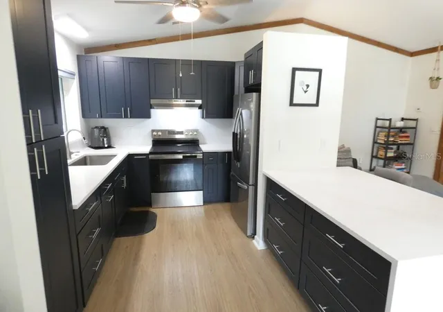 Photo 4 of Single family home for sale at 1368 Noell Blvd, Palm Harbor, FL 34683 | MLS# W7889197 | Listing updated on 2026-10-07