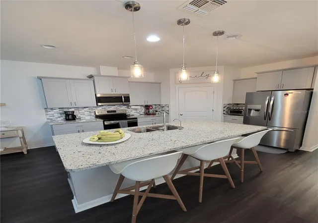 Photo 4 of Single family home for sale at 9456 Komika Ln, Winter Garden, FL 34787 | MLS# S5156916 | Listing updated on 2026-09-12