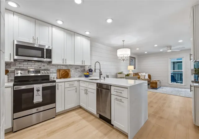 Listing Photo 4 - Condo for sale in building located at 230 Medallion Blvd, Madeira Beach, FL 33708 - Unit #F