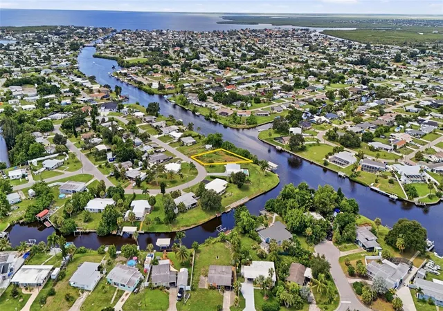 Photo 1 of Land for sale at 213 Waterway Cir NE, Port Charlotte, FL 33952 | MLS# C7530364 | Listing updated on 2026-09-06