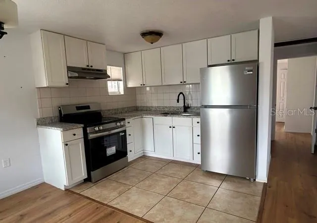 Photo 3 of Single family home for sale at 419 N 8th Street, Haines City, FL 33844 | MLS# TB8545566 | Listing updated on 2026-09-04