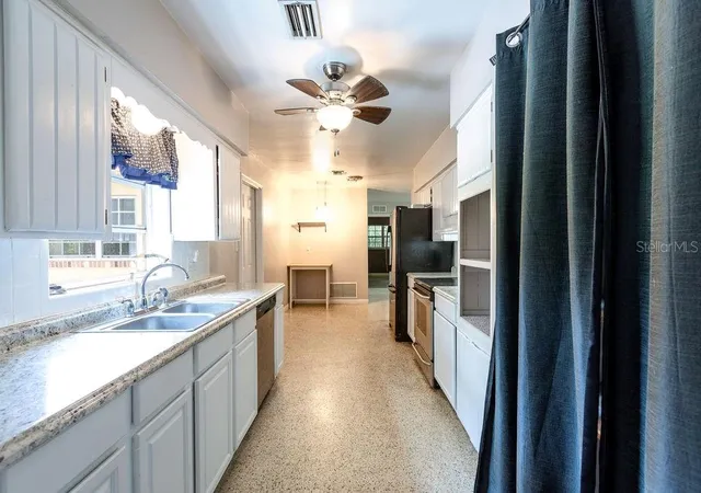 Photo 4 of Single family home for sale at 1407 NW 21st Avenue, Gainesville, FL 32605 | MLS# GC543253 | Listing updated on 2026-09-07