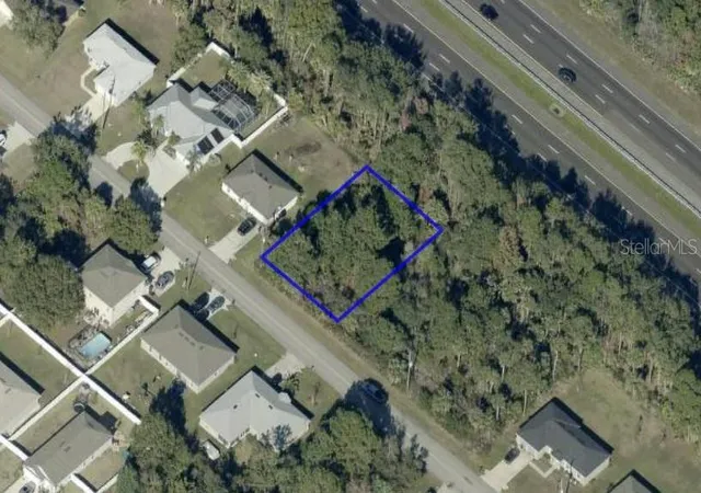 Photo 3 of Land for sale at 152 Bird Of Paradise Dr, Palm Coast, FL 32137 | MLS# TB8545585 | Listing updated on 2026-09-04