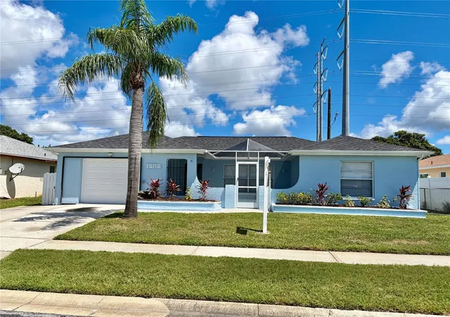 Photo 1 of Single family home for sale at 1202 Mandarin Dr, Holiday, FL 34691 | MLS# W7889213 | Listing updated on 2026-10-06