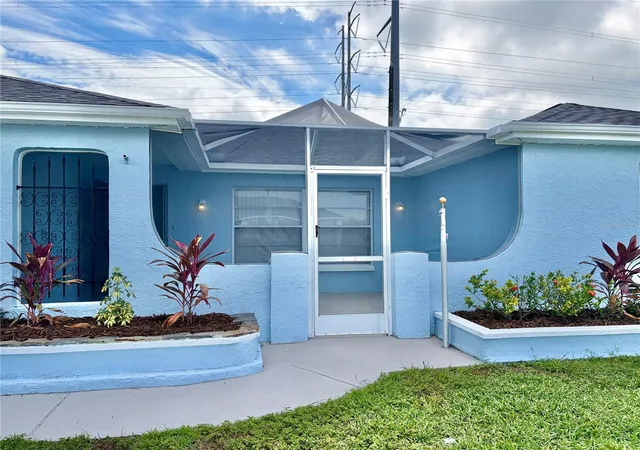 Photo 3 of Single family home for sale at 1202 Mandarin Dr, Holiday, FL 34691 | MLS# W7889213 | Listing updated on 2026-10-06