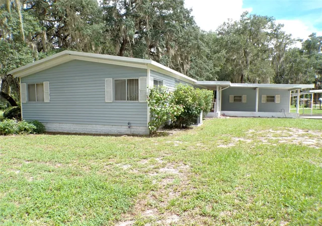 Photo 3 of Manufactured home for sale at 1991 Se 170th Avenue Rd, Silver Springs, FL 34488 | MLS# OM731696 | Listing updated on 2026-09-05