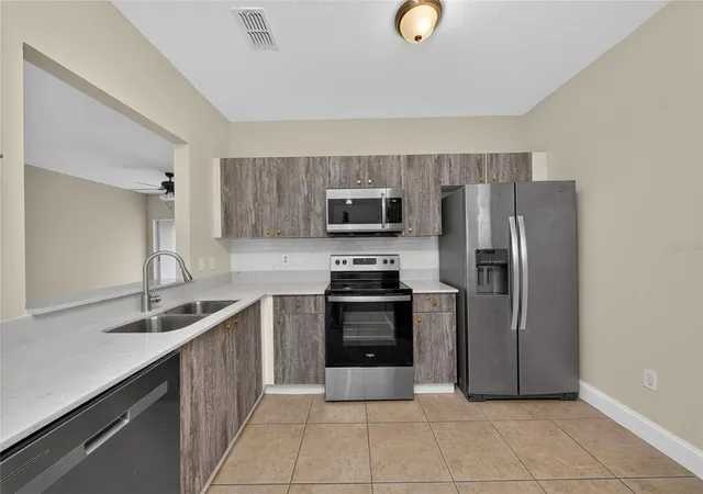 Photo 4 of Condo for sale at 515 Villa Del Sol Cir #205, Orlando, FL 32824 | MLS# O6439219 | Listing updated on 2026-09-05