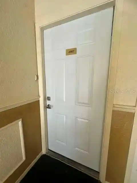 Listing Photo 2 - Condo for sale in 4007 Versailles Dr located at 4007 Versailles Dr, ORLANDO, FL 32808 - Unit #4007F