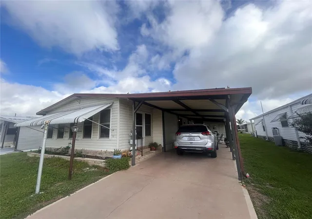 Photo 2 of Manufactured home for sale at 6455 Hollyberry Ln Ne, Winter Haven, FL 33881 | MLS# S5156959 | Listing updated on 2026-09-05