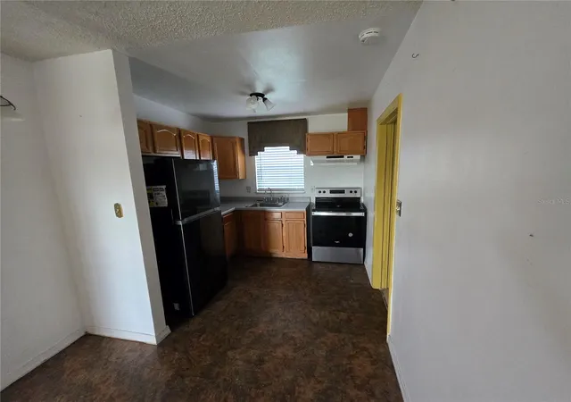 Photo 2 of Single family home for sale at 8202 Dahlia Ave, Tampa, FL 33619 | MLS# TB8545719 | Listing updated on 2026-09-14