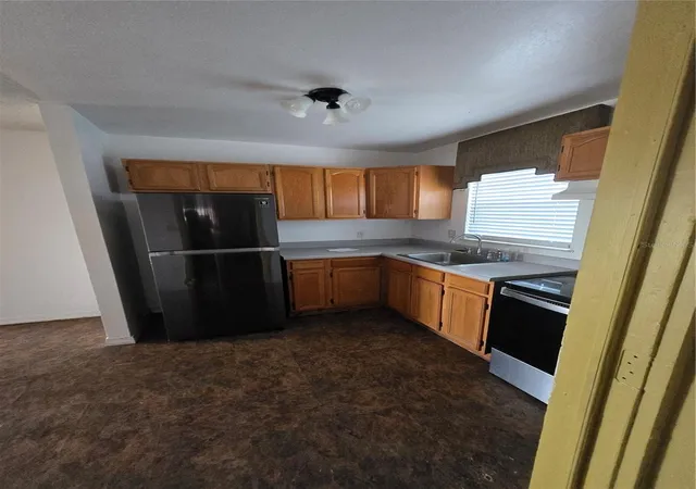 Photo 2 of Single family home for sale at 8202 Dahlia Ave, Tampa, FL 33619 | MLS# TB8545719 | Listing updated on 2026-09-14