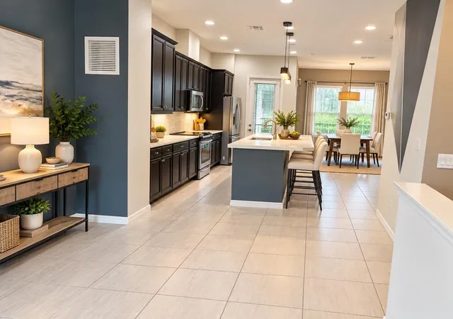 Photo 3 of Townhouse for sale at 727 Catalonia Cvs, Oviedo, FL 32765 | MLS# O6439301 | Listing updated on 2026-10-10
