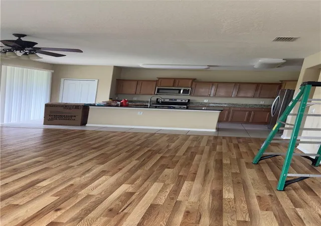 Photo 3 of Single family home for sale at 14207 Craftsbury Ct, Orlando, FL 32824 | MLS# O6439316 | Listing updated on 2026-09-12