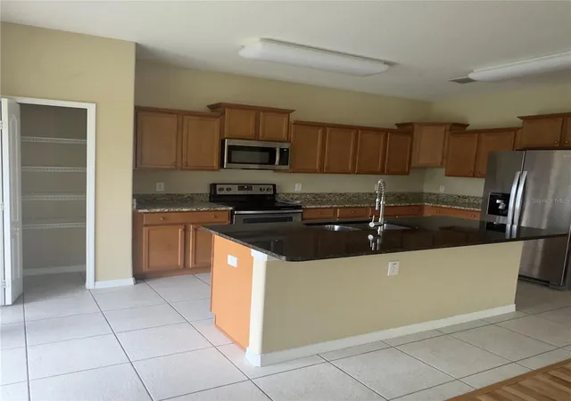 Photo 3 of Single family home for sale at 14207 Craftsbury Ct, Orlando, FL 32824 | MLS# O6439316 | Listing updated on 2026-10-09