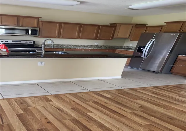 Photo 3 of Single family home for sale at 14207 Craftsbury Ct, Orlando, FL 32824 | MLS# O6439316 | Listing updated on 2026-09-12