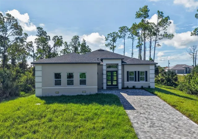 Photo 1 of Single family home for sale at 14511 Argus Ln, Port Charlotte, FL 33981 | MLS# O6439321 | Listing updated on 2026-09-05