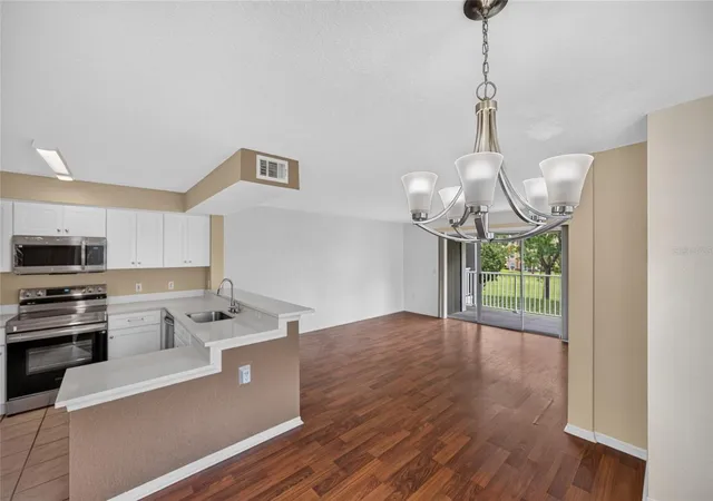 Photo 3 of Condo for sale at 14013 Fairway Is Dr #428, Orlando, FL 32837 | MLS# O6439322 | Listing updated on 2026-09-05