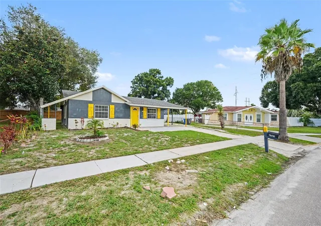Photo 3 of Single family home for sale at 8503 Fish Lake Rd, Tampa, FL 33619 | MLS# O6439324 | Listing updated on 2026-09-05