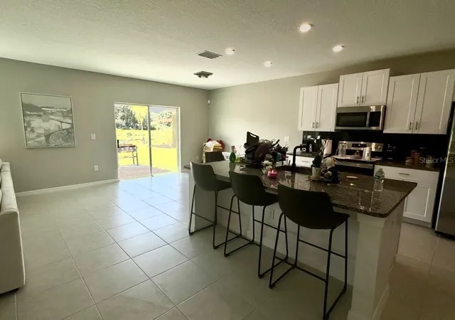 Photo 3 of Single family home for sale at 4049 Capri Coast Dr, Plant City, FL 33565 | MLS# O6439356 | Listing updated on 2026-09-16