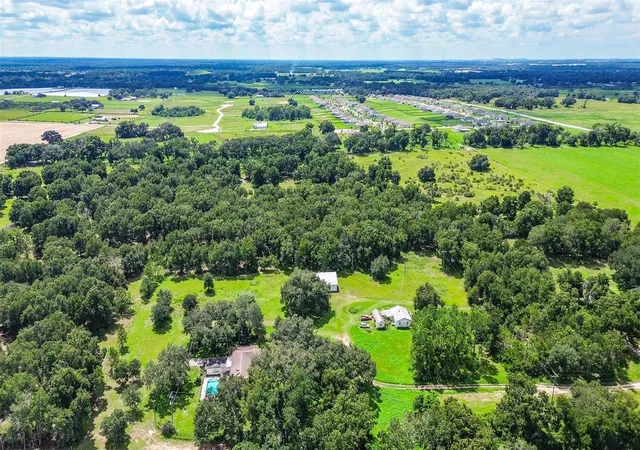 Single family home for sale at 11327 Carter Grv Ln, THONOTOSASSA, FL 33592 | MLS# TB8545827