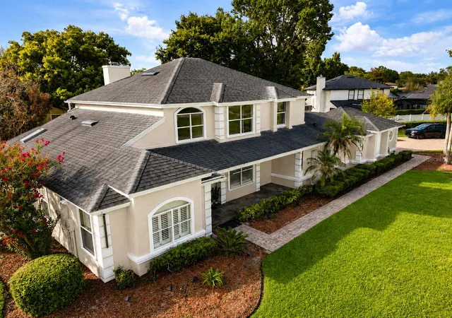 Photo 2 of Single family home for sale at 7903 Palmdale Dr, Orlando, FL 32819 | MLS# O6439378 | Listing updated on 2026-10-01
