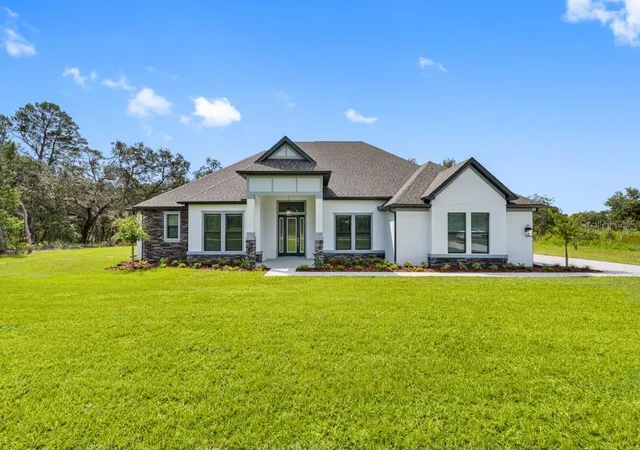 Photo 1 of Single family home for sale at 13570 Saddlebred Ln, Hudson, FL 34667 | MLS# TB8545866 | Listing updated on 2026-10-06