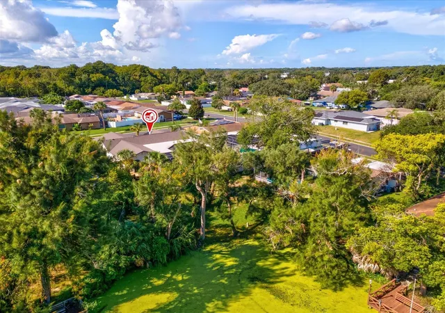 Photo 52 of Single family home for sale at 6907 Bottle Brush Dr, Port Richey, FL 34668 | MLS# TB8545877 | Listing updated on 2026-09-07