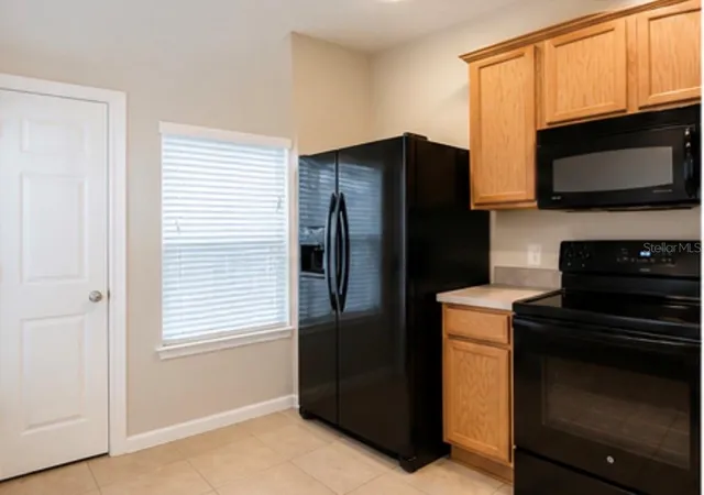 Photo 3 of Townhouse for sale at 4901 Sw 45th Street, Ocala, FL 34474 | MLS# OM731756 | Listing updated on 2026-09-05