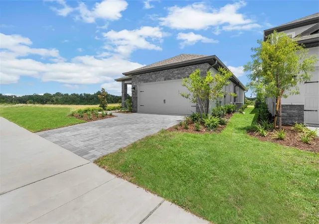Photo 2 of Single family home for sale at 7701 Somersworth Dr, Kissimmee, FL 34747 | MLS# TB8545882 | Listing updated on 2026-10-15