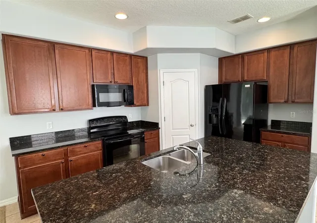 Photo 4 of Sale Pending at 4984 Matteo Trl, Orlando, FL 32839 | MLS# O6439421 | Listing updated on 2026-10-20