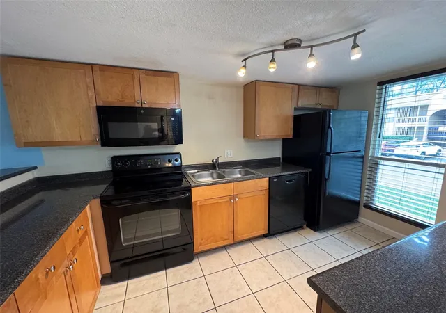 Photo 2 of Condo for sale at 1810 Nw 23rd Boulevard #141, Gainesville, FL 32605 | MLS# GC543283 | Listing updated on 2026-09-14