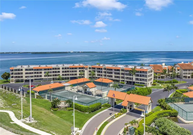 Listing Photo 1 - Condo for sale in building located at 103 1St St E, Tierra Verde, FL 33715 - Unit #306