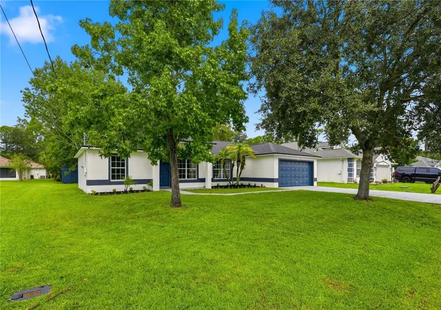 Photo 2 of Single family home for sale at 23 Luther Dr, Palm Coast, FL 32137 | MLS# FC321244 | Listing updated on 2026-09-08