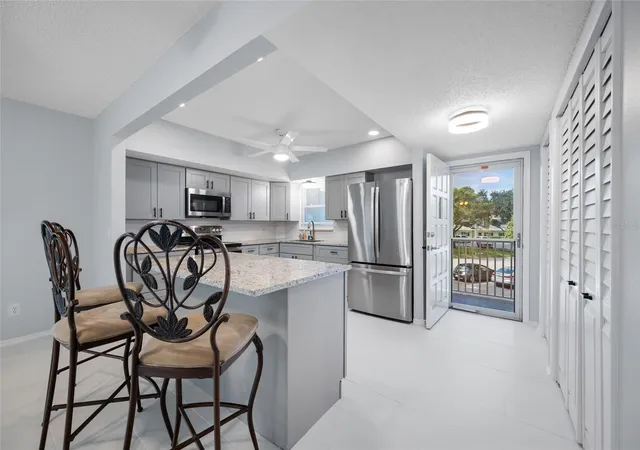 Listing Photo 4 - Condo for sale in building located at 2258 World Pkwy Blvd W, Clearwater, FL 33763 - Unit #40