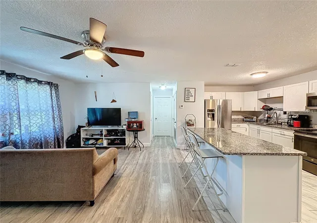 Photo 3 of Single family home for sale at 7211 Pinion Dr, Orlando, FL 32818 | MLS# O6439519 | Listing updated on 2026-09-06