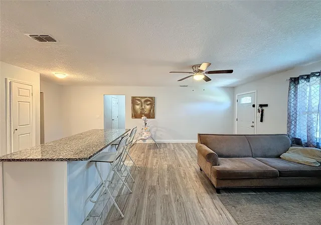 Photo 3 of Single family home for sale at 7211 Pinion Dr, Orlando, FL 32818 | MLS# O6439519 | Listing updated on 2026-10-30