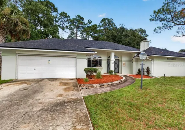 Photo 2 of Single family home for sale at 110 Wellington Dr, Palm Coast, FL 32164 | MLS# GC543289 | Listing updated on 2026-09-06