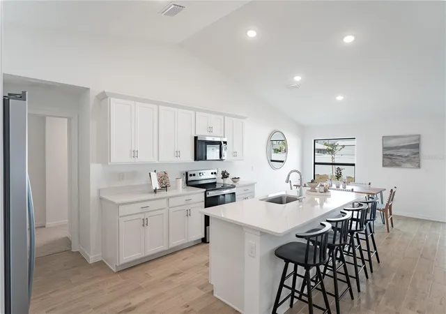 Photo 2 of Single family home for sale at 407 Sherbourne St, Port Charlotte, FL 33954 | MLS# A4705207 | Listing updated on 2026-09-22