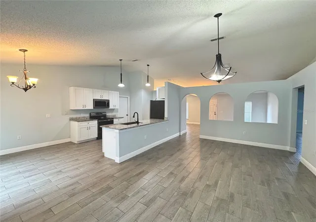 Photo 2 of Single family home for sale at 3243 Greynolds Ave, Spring Hill, FL 34608 | MLS# OM731787 | Listing updated on 2026-09-15