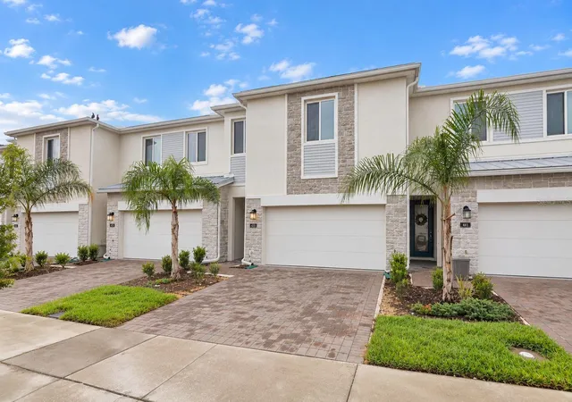 Photo 1 of Townhouse for sale at 433 Bogey Dr, Davenport, FL 33896 | MLS# O6439538 | Listing updated on 2026-09-21